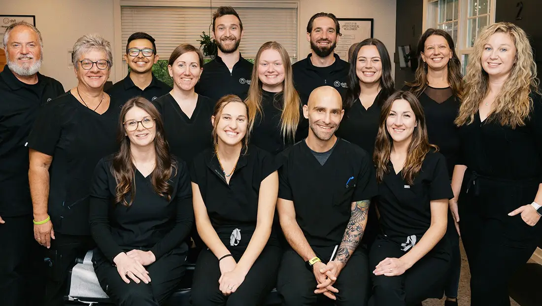 Chiropractor Traverse City Kyle Konas With Staff