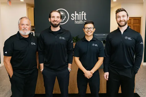Chiropractor Traverse City MI Kyla Konas With Team