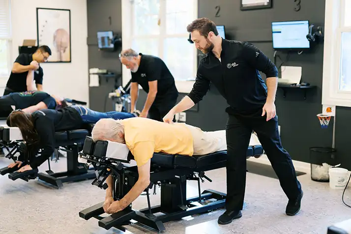 Chiropractor Traverse City MI Rick Murphy Adjusting Patients