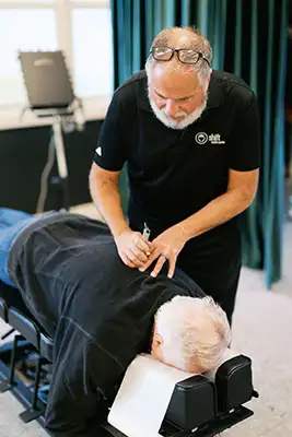 Chiropractor Traverse City MI Rick Murphy Adjustment Tool